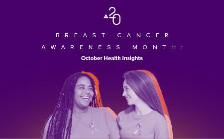 Two women smiling and wearing pink ribbons for Breast Cancer Awareness Month, promoting October health insights and prevention.